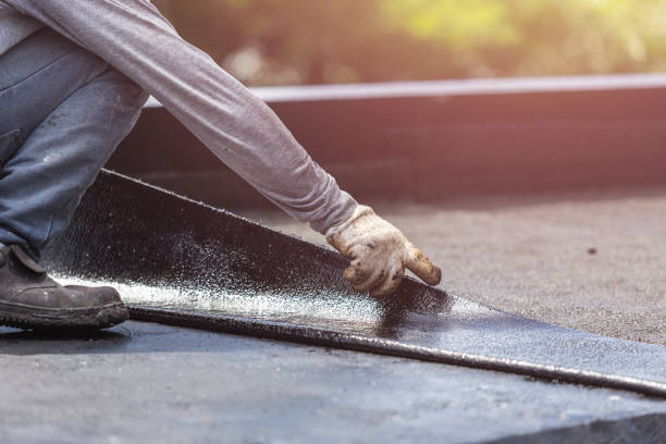 Professional Emergency Waterproofing technician working in Burnsville, MN
